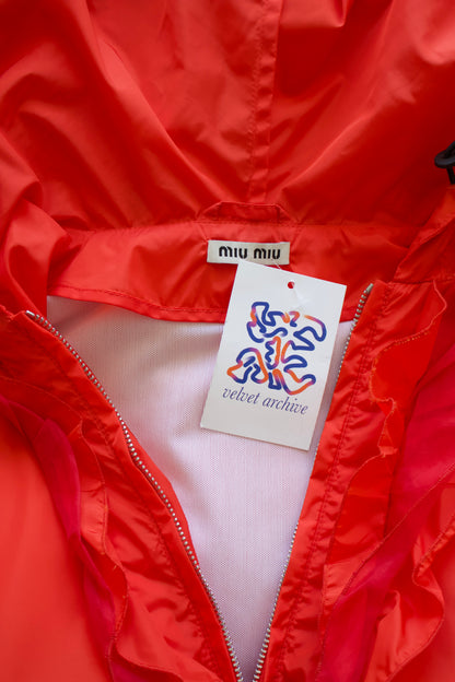 Miu Miu orange nylon raincoat with ruffles
