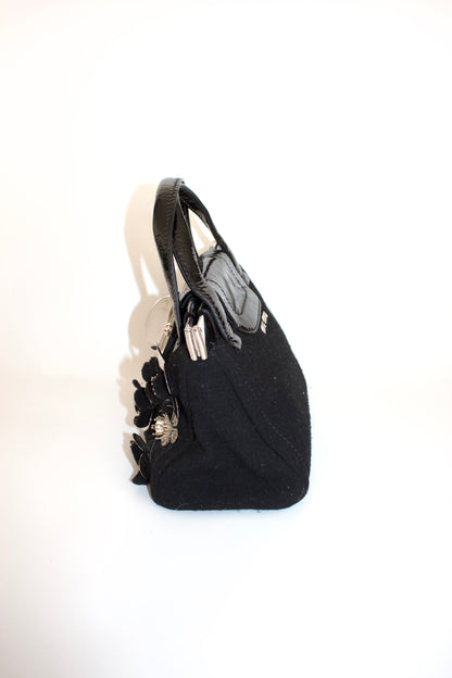 Miu Miu FW2010 black handbag with metallic flowers
