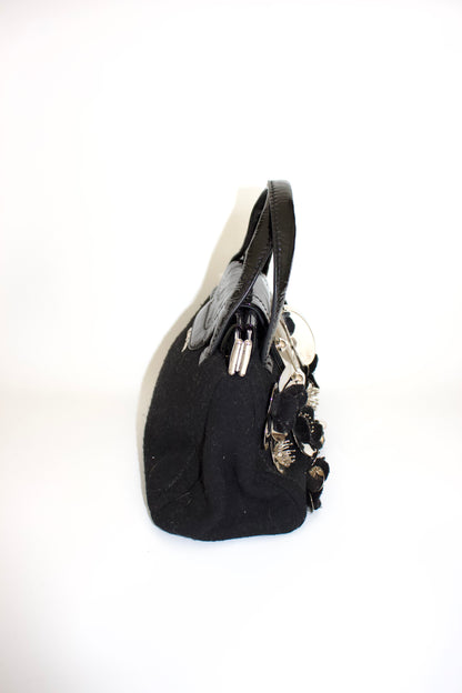 Miu Miu FW2010 black handbag with metallic flowers