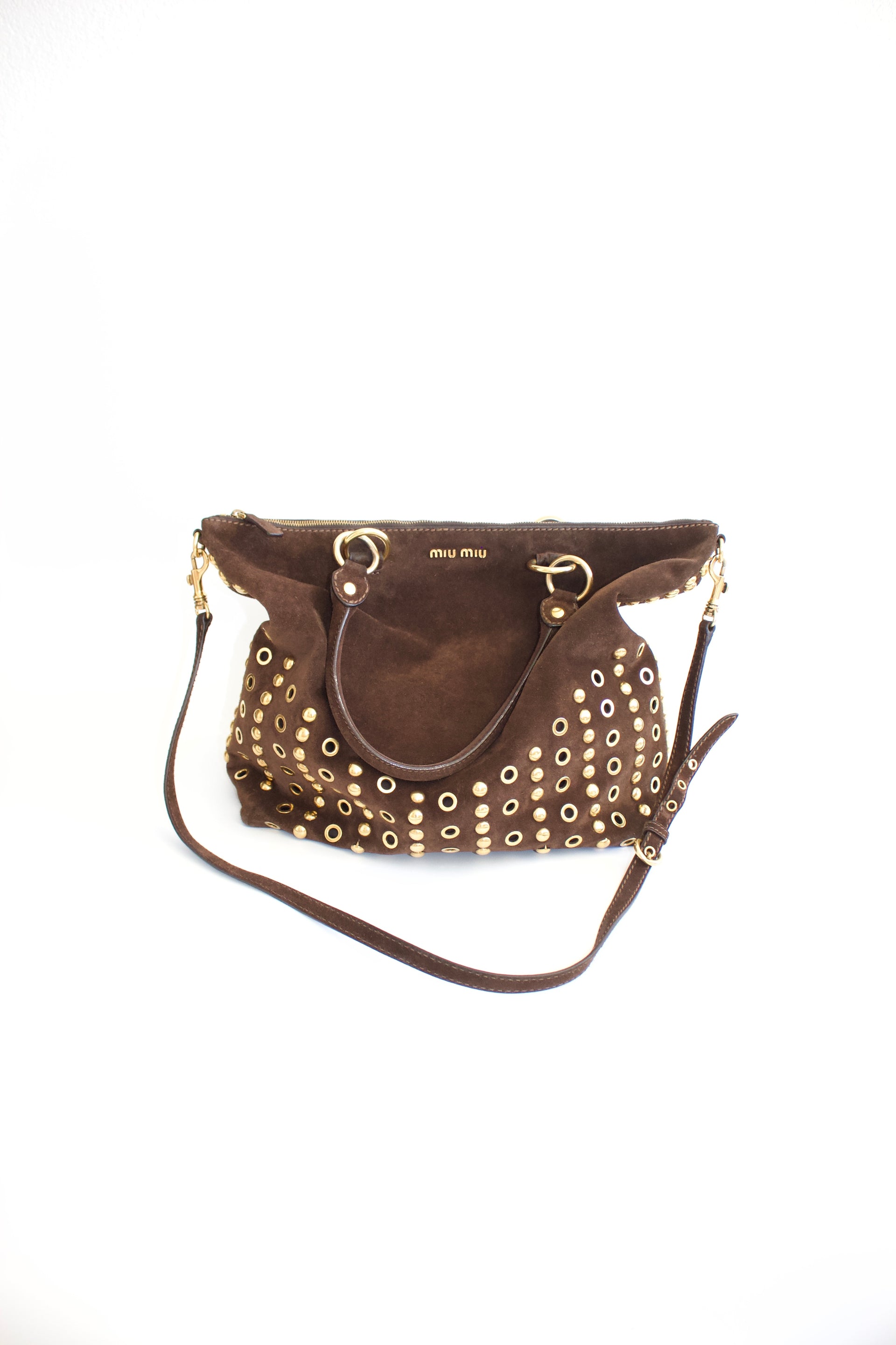 Miu Miu brown suede bag with golden eyelets and grommets – Velvet 