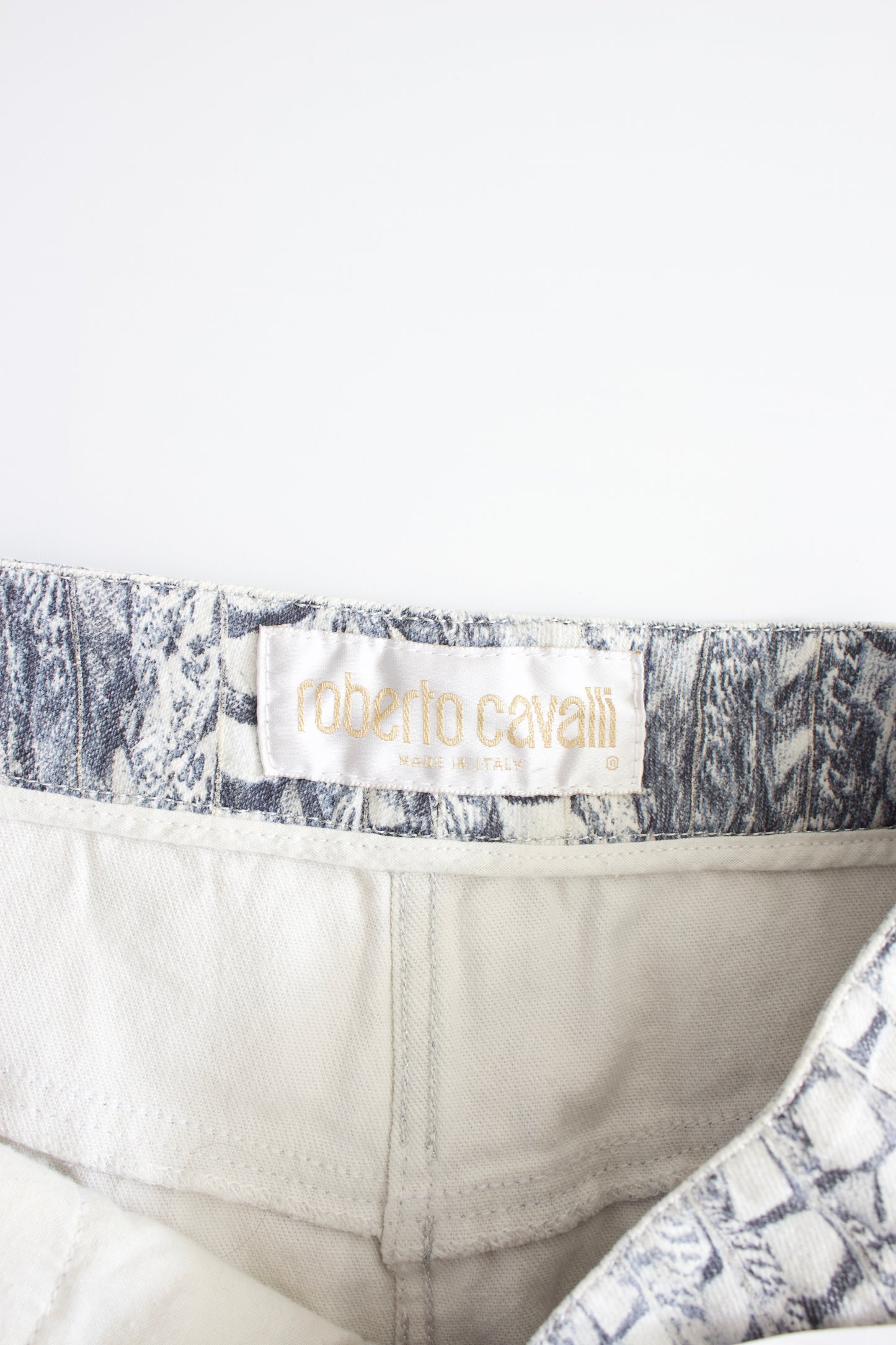 Roberto Cavalli denim skirt with feather print and side zips