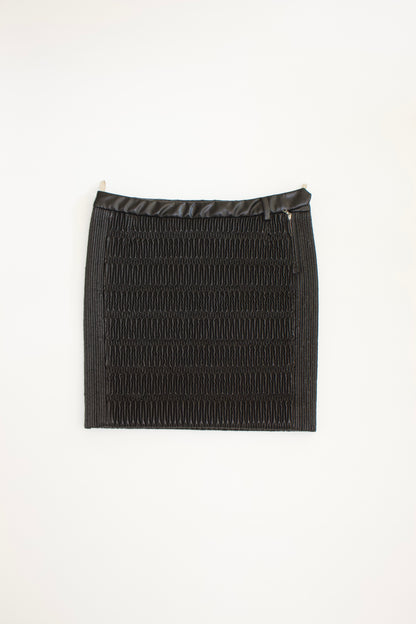 Prada 2000s black matelassé faux leather mini-skirt