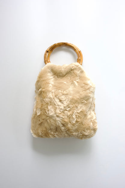 La Perla cream fur bag with bambo handles