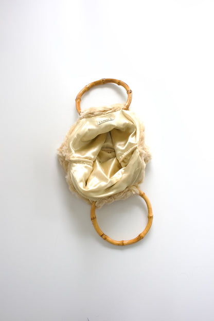 La Perla cream fur bag with bambo handles
