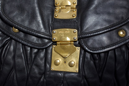 Miu Miu black matelasse Coffer crossbody bag