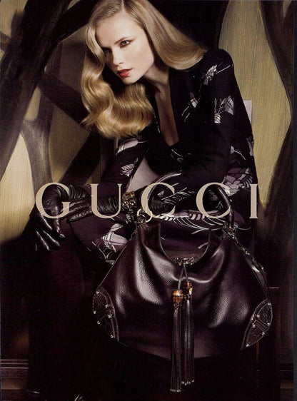 Gucci Indy brown monogram bag with mink fur tassels